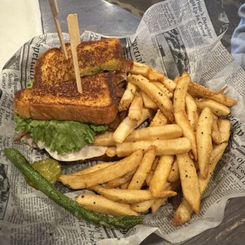 Tranquil Harbour Restaurant & Bar - Turkey club with fries. - Seafood Near Me - Oak Island, North Carolina Tranquil Harbour Restaurant & Bar - Turkey club with fries. - Seafood Near Me - Oak Island, North Carolina
