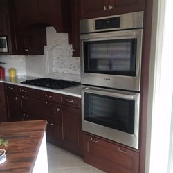 Lifestyle Kitchens & Baths - Double stove, range, handmade subway tile, and marble niche.