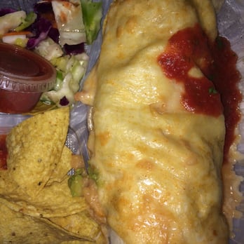 Pokez - My Texas-sized Texas Burrito appears to have a gunshot wound. Don't worry: it's just salsa. - Mexican Near Me - San Diego, California