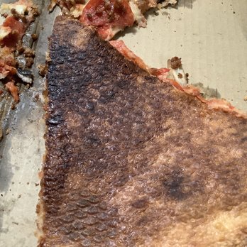 Village Road Pizzeria - Bottom of pizza - BURNED! - Pizza Near Me - Long Beach, California