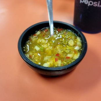 Torero's - a bowl of soup with a spoon in it - Mexican Near Me - Harrisburg, Oregon