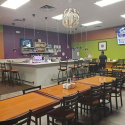 Hot N Spicy Restaurant and Bar - Inside view of bar and tables