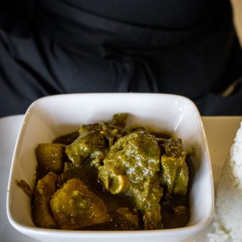 Palm Court - Curry Goat with rice and dhal - Caribbean Near Me - Oshawa, Ontario