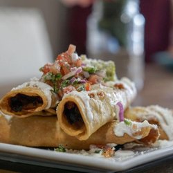 Beef taquitos with our special green salsa, sour cream, pico de gallo