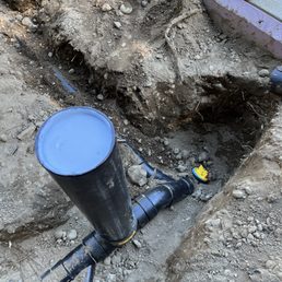 a black pipe with a blue lid a black pipe with a blue lid