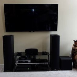 E-Z-AZ That - 70" flatscreen with 5.1 surround sound.