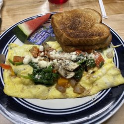 Park Place Restaurant - Greek omelette without olives, add bacon and mushrooms. Good! That house hot sauce is amazing! I wish they sold it.