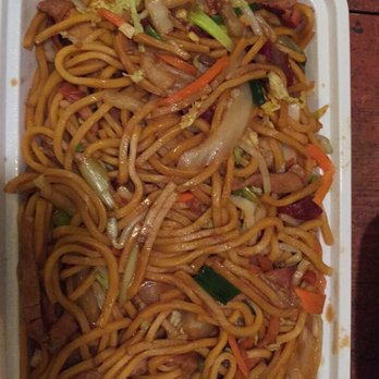 Golden Palace - noodles in a white container on a wooden table - Sushi Bars Near Me - Woodbury, New Jersey