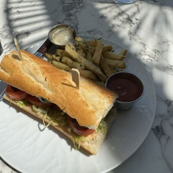 Aqua Penny's - Blackened shrimp po boy with truffle fries - Seafood Near Me - Leawood, Kansas