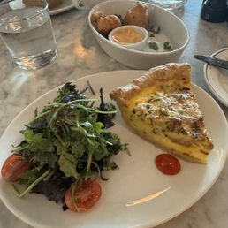 Quiche Lorraine, salad and crawfish beignets Quiche Lorraine, salad and crawfish beignets
