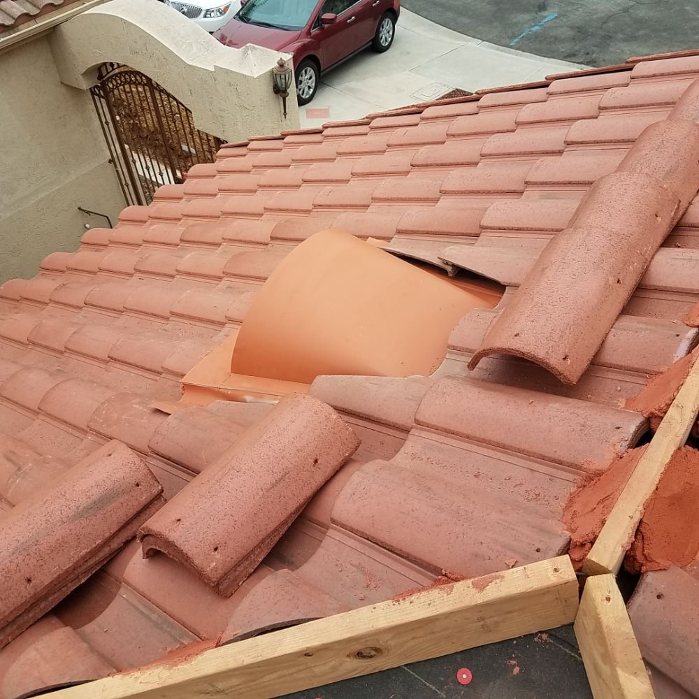 Slide of Oscar's Roofing