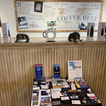 PJ's Coffee - a table with a variety of items on it - Coffee & Tea Near Me - San Antonio, Texas PJ's Coffee - a table with a variety of items on it - Coffee & Tea Near Me - San Antonio, Texas