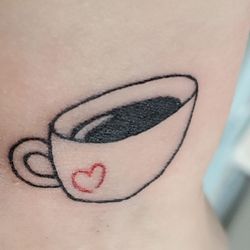 Prairie State Tattoo - I am a coffee addict and he did beautifully with this on my inner wrist. Angle of the picture is off . It's beautifully done