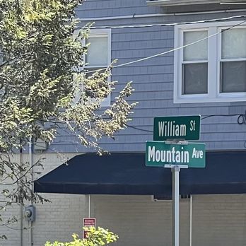 Nunzio's Pizza - a street sign in front of a building - Pizza Near Me - Scotch Plains, New Jersey Nunzio's Pizza - a street sign in front of a building - Pizza Near Me - Scotch Plains, New Jersey