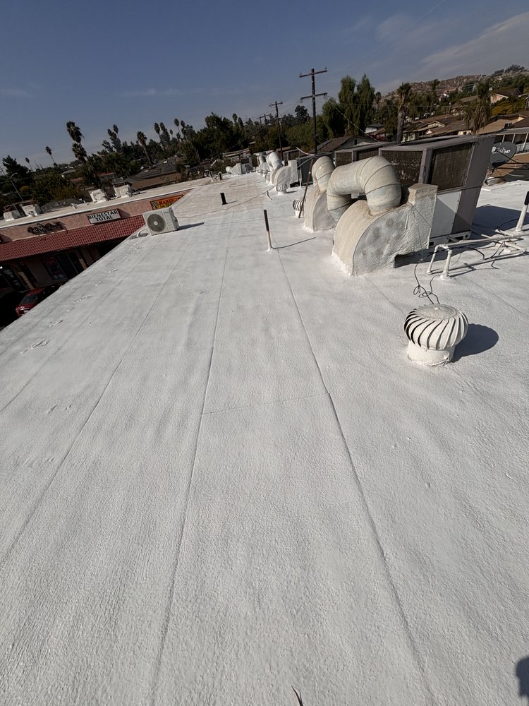 Slide of Troy Construction Roof & Solar