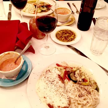 Pignetti's - Our table is pretty full! Swanson merlot, chicken Parmesan, tomato basil and black drum for my husband - Italian Near Me - Temple, Texas Pignetti's - Our table is pretty full! Swanson merlot, chicken Parmesan, tomato basil and black drum for my husband - Italian Near Me - Temple, Texas