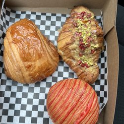 Pan Au Chocolate (delicious), pistachio pomegranate (so good) and raspberry cheesecake
