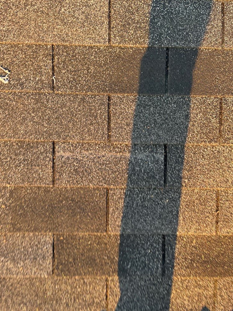 Slide of J’s Roofing