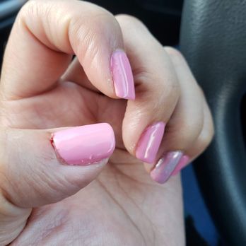 Elegant Nails & Spa - Taken minutes after the service. As you can see my thumb is bleeding and the application is really uneven and lumpy - Nail Salons Near Me - Seaside, California Elegant Nails & Spa - Taken minutes after the service. As you can see my thumb is bleeding and the application is really uneven and lumpy - Nail Salons Near Me - Seaside, California