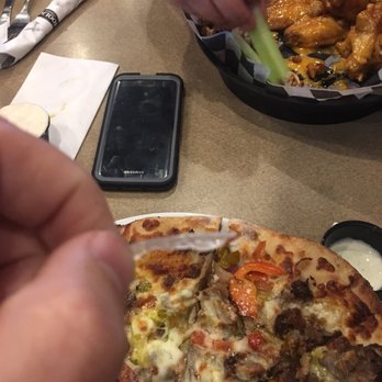 Hooligans Eastside Grill - Big piece of plastic in my Philly Cheesesteak Pizza... - American Near Me - Webster, New York
