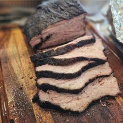 Brisket N BBQ - BBQ Brisket being sliced.