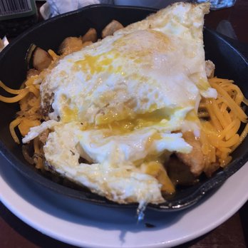 Scrambled - Star City Skillet with home fries, bacon, cheddar cheese, and 2 eggs over easy. - Breakfast & Brunch Near Me - Roanoke, Virginia
