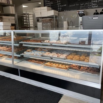 Glazed - a display case with a variety of pastries - Donuts Near Me - Xenia, Ohio