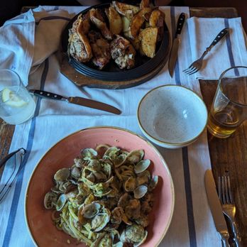 Tiberino - Lamb entrée with potato + Seafood pasta - Bistros Near Me - Rome, RM Tiberino - Lamb entrée with potato + Seafood pasta - Bistros Near Me - Rome, RM