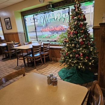 Frank's at Brambleton - One of the dining areas of the restaurant close to the front window and Christmas tree. - Pizza Near Me - Roanoke, Virginia