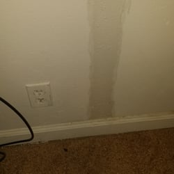 Gaslight Walk - By the electrical outlet. I told them 2 months ago when the corner was wet. STILL NOTHING FIXED.