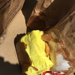 a sandwich in a brown paper bag a sandwich in a brown paper bag