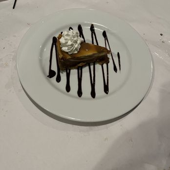 Duck City Bistro - Carmel Cheesecake.  So good, you don't even feel guilty eating it!!! - Bars Near Me - Davenport, Iowa