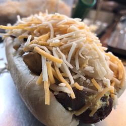 The Haute Doggerie - N.Y. Style - Spicy BrownDeli Mustard, Sautéed Onion, sauerkraut, and cheddar jack cheese - Yum!