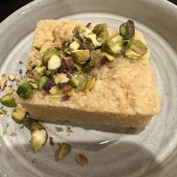 Plume Algiers - Milk cake with pistachios - Indian Near Me - New Orleans, Louisiana Plume Algiers - Milk cake with pistachios - Indian Near Me - New Orleans, Louisiana