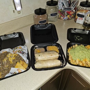 Abelardo's Mexican Restaurant - Left - Super Nacho, middle - 2 beef burrito, right - 12 taquitos w/cheese n guac! - Mexican Near Me - Bellevue, Nebraska