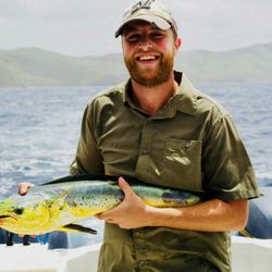 Blue Canyon Charters - First time saltwater fisherman Andrew landing his first Mahi Mahi