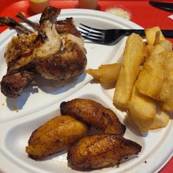 El Gran Pollo - I had eaten some of the plaintains at the point I took the pic. Chicken was small. Overall, it was delicious.