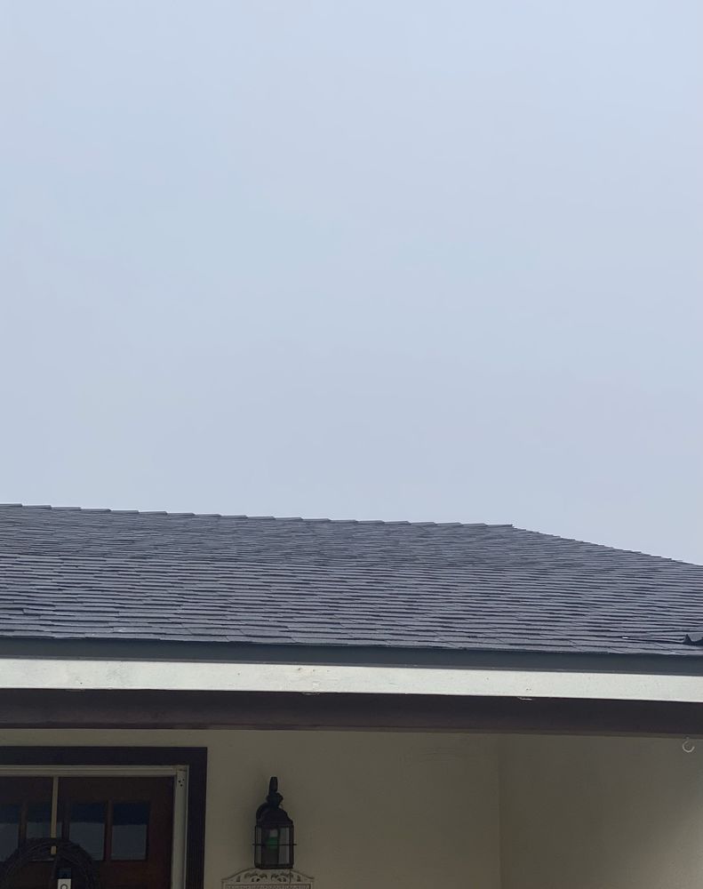 Slide of JMT Roofing