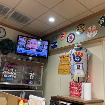 George Webb - a restaurant with a large television and signs on the wall - Breakfast & Brunch Near Me - Waukesha, Wisconsin George Webb - a restaurant with a large television and signs on the wall - Breakfast & Brunch Near Me - Waukesha, Wisconsin
