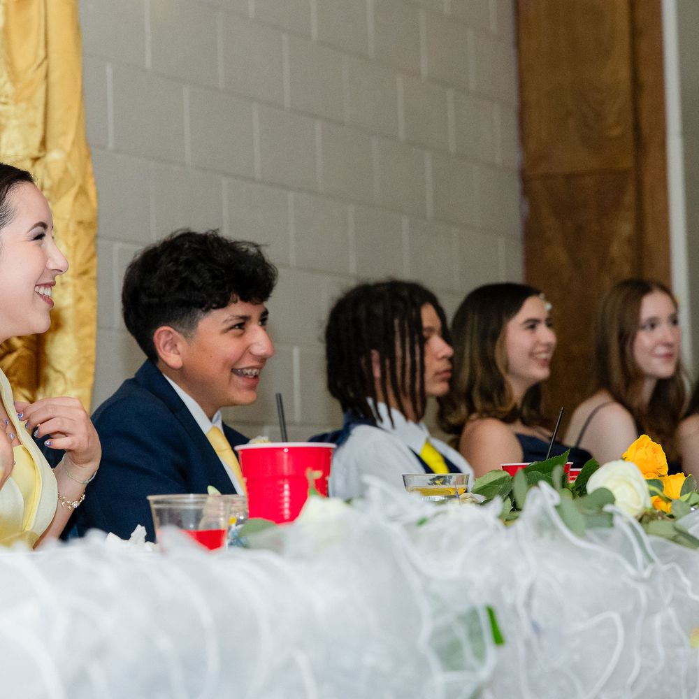 Meg Hudson Photography - Enjoying the speeches - Session Photography Near Me