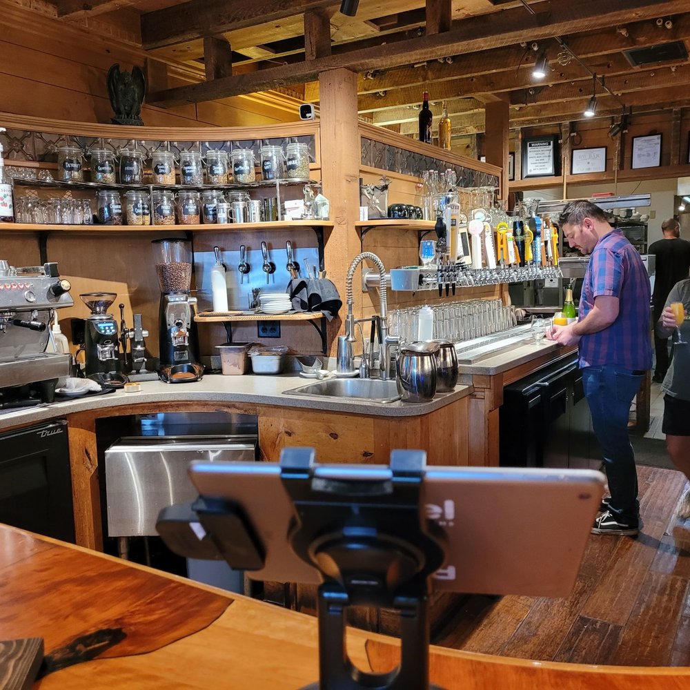 Raven Cafe - a group of people standing around a bar - Sandwiches Near Me - Prescott, Arizona Raven Cafe - a group of people standing around a bar - Sandwiches Near Me - Prescott, Arizona