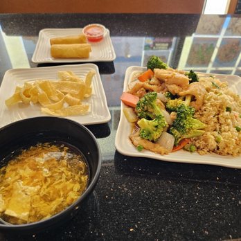 China A Go Go - The lunch portion! Chicken and broccoli with fried rice. Egg drop soup and 2 vegetable egg rolls. - Chinese Near Me - Las Vegas, Nevada