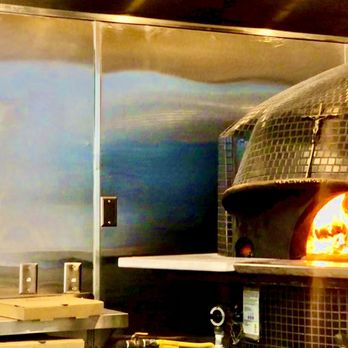 Sei Pizza Bar - Yelp bandana wearing pizza chef and the pizza oven imported from Naples - Pizza Near Me - Los Angeles, California