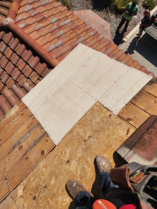 Slide of MMM Roofing