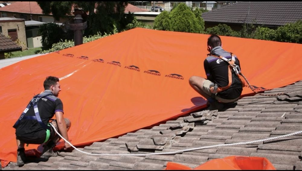 Slide of Pro Tarp Roofing Solutions
