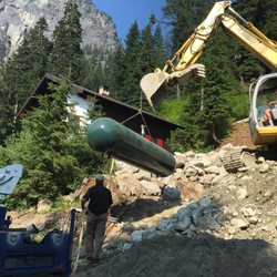 PacWest Propane - Derrick installing a 1000 underground on snoqualmie pass.