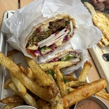 Laziz Kitchen - Falafel wrap with fries and hot sauce - Mediterranean Near Me - Salt Lake City, Utah Laziz Kitchen - Falafel wrap with fries and hot sauce - Mediterranean Near Me - Salt Lake City, Utah