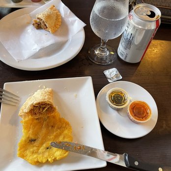 Puerto Madero Miami - Tostones and meat Empanadas Fritas - Argentine Near Me - Miami, Florida Puerto Madero Miami - Tostones and meat Empanadas Fritas - Argentine Near Me - Miami, Florida