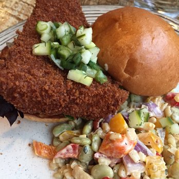 Grub Durham - The Barracuda with butter bean corn side dish. Crunchy on the outside, tender and flaky on the inside with a creamy sauce and brioche bun. - Southern Near Me - Durham, North Carolina