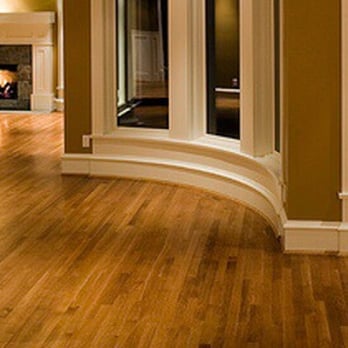 Pars Flooring - an empty room with a fireplace - Flooring Near Me Pars Flooring - an empty room with a fireplace - Flooring Near Me